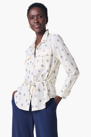 NIC+ZOE Constellation Jacket in Cream with navy miniature print.  Pointed collar button down hybrid shirt jacket.  Long sleeves with button cuffs.  Back yoke.  Shirt tail hem.  Cinch tie at waist.  Relaxed fit._35249431838920
