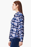 NIC+ZOE Shibori Glow Shirt in Indigo Multi. Shibori print button down blouse with covered button placket. Long sleeve with button cuff. Back yoke. Shirt tail hem. Relaxed fit._t_34973710057672