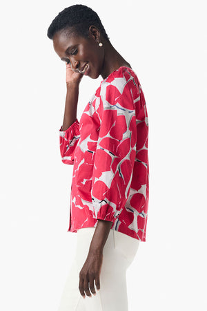 NIC+ZOE Bold Petals Shirt in Red Multi. Bold large abstract petals. Round neck notched v button down with 3/4 length raglan sleeve. Elastic cuffs. Banded neckline. Relaxed fit._35084305432776