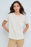 Lisa Todd Pick Me Up in Puff.  Crew neck short sleeve pocket tee with neon pink embroidery around the neckline and on the pocket. Classic fit._t_60268326715758