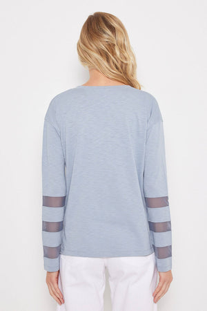Lisa Todd Mesh Fest V Top in Denim.  Banded v neck long sleeve top with 3 mesh inset stripes on lower sleeve.  Side slits.  Relaxed fit._59989236384110