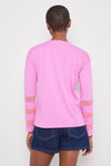 Lisa Todd Mesh Fest V Top in Hot Orchid.  Banded v neck long sleeve top with 3 mesh inset stripes on lower sleeve.  Side slits.  Relaxed fit._t_59989236285806