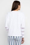 Lisa Todd Mesh Fest V Top in White.  Banded v neck long sleeve top with 3 mesh inset stripes on lower sleeve.  Side slits.  Relaxed fit._t_59989236318574