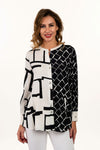 Lemon Grass Mixed Media Blouse with Back Detail in Black and Cream. Mixed geometric prints.  Button down with solid crew stand collar and cuffs.  Novelty rounded metal buttons.  Long sleeves with cufflink cuff closure.  Cross over fabric at back hem. Relaxed fit._t_35061510570184