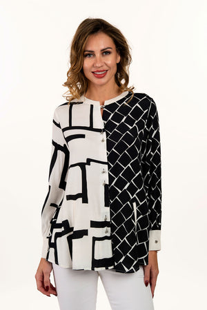 Lemon Grass Mixed Media Blouse with Back Detail in Black and Cream. Mixed geometric prints.  Button down with solid crew stand collar and cuffs.  Novelty rounded metal buttons.  Long sleeves with cufflink cuff closure.  Cross over fabric at back hem. Relaxed fit._35061510570184