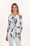 Lemon Grass Hi V Neck Printed Top in Blue. Stylized leaf  print in shades of blue, with black stems on a white background.  High banded v neck.  3/4 sleeve with button and loop closure.  2 front slits.  Curved hem.  Relaxed fit._t_60028196520302