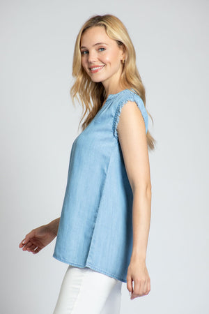 APNY Sleeveless Fray Top. Light Denim tencel sleeveless top with split v front. Banded crew neck with soft gathers. Fringe trim at armhole. Straight hem. Side slits. Relaxed fit._35228985360584