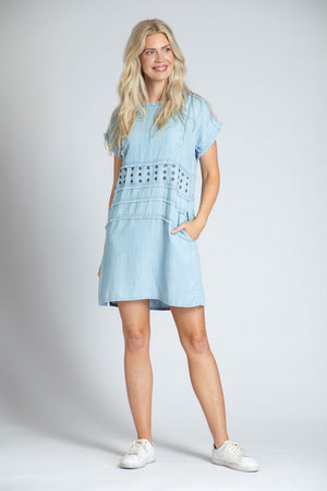APNY Denim Grommet Dress in Blue.  Tencel denim a line dress.  Crew neck with cap sleeve.  Inset panels at waist and hip.  Grommet detail on waist panel.  In seam pockets.  Fringe trim at neck and sleeves. Side slits.  Relaxed fit._35229010788552