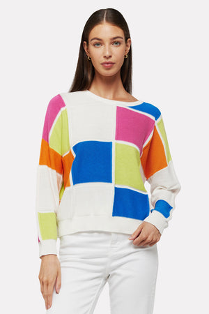 WISPR by Brodie Bianca Crew Sweater.  Bright blocks of glue, orange, pink, lime and white.  Textural knit using different stitches on blocks and outline.  Crew neck, long sleeve sweater with drop shoulder.  Rib trim at neck, hem and cuff.  Relaxed fit.  Shorter length._35061401780424