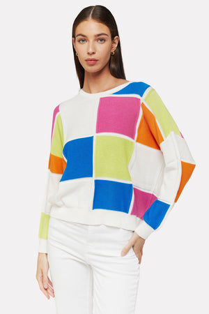 WISPR by Brodie Bianca Crew Sweater. Bright blocks of glue, orange, pink, lime and white. Textural knit using different stitches on blocks and outline. Crew neck, long sleeve sweater with drop shoulder. Rib trim at neck, hem and cuff. Relaxed fit. Shorter length._35061401845960