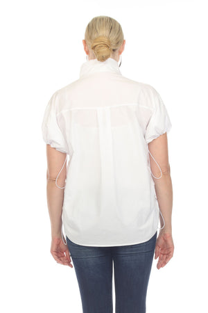 Terra Toggle Short Sleeve Blouse in White. Convertible collar button down blouse with short sleeves. Cinchable elastic sleeve hem with toggle detail. Adjustable side ruching with toggle. Curved hem. Relaxed fit._35044896506056