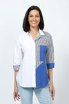 Terra Color Block Stripe Blouse in Navy. Color block stripes, and solids mixed with white panels. Convertible collar button down with 3/4 sleeve. 1 solid cuff and 1 striped cuff. Back striped yoke. Shirt tail high low hem. Relaxed fit._t_35167396659400