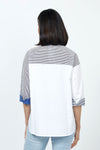 Terra Color Block Stripe Blouse in Navy. Color block stripes, and solids mixed with white panels. Convertible collar button down with 3/4 sleeve. 1 solid cuff and 1 striped cuff. Back striped yoke. Shirt tail high low hem. Relaxed fit._t_35167396692168