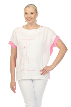 Terra Stitch Design Top in White/Pink.  White front and pink back.  Crew neck dolman short sleeve top .  Pink hand stitch and button detail.  Wrapped seams from back to front.  Inseam pockets.  Side slits.  Relaxed fit._35167329190088