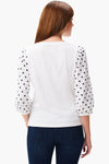 NIC+ZOE Eyelet Breeze Top in White. Boatneck top with elbow length eyelet embroidered sleeve. Classic fit._t_34829810663624