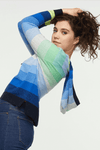 Zaket & Plover Birdseye Stripe Hoodie in Blues. Striped sweater in shades of blue and green in a variety of stripe stitching. V neck sweater with attached drawstring hood and solid trim around hood and neckline. Long sleeves. Ribbed trim at hem and cuff. High low hem. Slightly relaxed shape._t_34394332856520