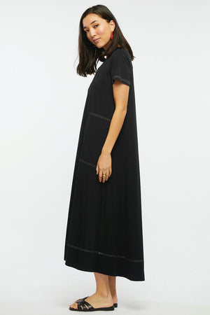 Zaket & Plover T Shirt Dress in Black. Scoop neck short sleeve a line dress with white overstitching detail. Maxi length. Relaxed fit._34998112190664