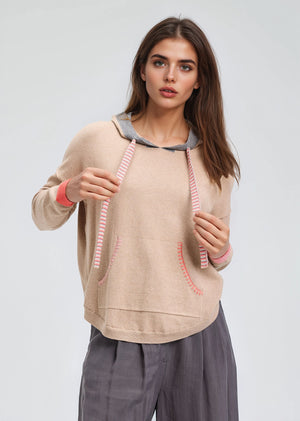 Zaket & Plover Joey Pocket Hoodie in Oat.  Camel pullover cotton/cashmere hoodie with contrast trim on hood and striped drawstring.  Long sleeves with contrast colored ribbed cuffs.  Front pouch pocket.  Blanket stitch trim at shoulders and pocket opening.  Curved hem with ribbing.  Relaxed fit._61466238681454