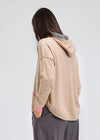 Zaket & Plover Joey Pocket Hoodie in Oat.  Camel pullover cotton/cashmere hoodie with contrast trim on hood and striped drawstring.  Long sleeves with contrast colored ribbed cuffs.  Front pouch pocket.  Blanket stitch trim at shoulders and pocket opening.  Curved hem with ribbing.  Relaxed fit._t_61466238714222