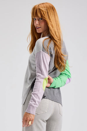 Zaket & Plover Elbow Intarsia Sweater in Marl.  Marled gray front, light purple leftsleeve, light green right sleeve medium gray heathered back.  Contrast color intarsia elbow patches.  Crew neck long sleeve sweater.  Rib trim at neck, hem and cuff.  Side slits.  Relaxed fit._61200483516782
