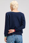 Zaket & Plover Threaded Star Sweater in Dark Denim.  Boatneck dolman long sleeve knit.  2 intarsia and embroidered stars on front.  Contrast color threaded double rows of stitching down each sleeve.  Plain back.  Rib trim at neck and cuff.  Side slits.  Relaxed fit._t_61395590971758