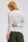 Zaket & Plover Threaded Star Sweater in Marled gray.  Boatneck dolman long sleeve knit.  2 intarsia and embroidered stars on front.  Contrast color threaded double rows of stitching down each sleeve.  Plain back.  Rib trim at neck and cuff.  Side slits.  Relaxed fit._t_61395591070062