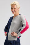 Zaket & Plover Split Sweater in Dark Denim.  Split front and sleeve color block in dark denim and heather gray.  Striped back. Raglan long sleeves with  color blocked back of sleeve.  Contrast cuff.  Rib trim.  Side slits. Relaxed fit._t_61399657841006