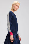 Zaket & Plover Split Sweater in Dark Denim.  Split front and sleeve color block in dark denim and heather gray.  Striped back. Raglan long sleeves with  color blocked back of sleeve.  Contrast cuff.  Rib trim.  Side slits. Relaxed fit._t_61399657873774