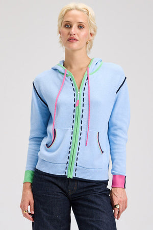Zaket & Plover Threaded Hoodie in Sky.  Zip front hoodie with green contrast zipper placket and hoodie trim.  Blue handstitching  next to zipper placket.  Contrast color ribbed cuffs .  2 front patch pocket with rainbow striped trim.  Rib hem.  Striped trim at armhole.  Relaxed fit._61025110065518