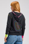 Zaket & Plover Heart Embroidered Hoodie in Charcoal.  Zip front with attached hood.  Contrast color striping on each size of placket and around hood.  Contrast drawstrings.  Long sleeve with color block cuffs. 2 front pouch pockets. Blanket stitch detail at armhole and pocket trim.  Rib trim at cuff and hem.  Embroidered concentric hearts in multi colors on back.  Relaxed fit._t_61399583850862