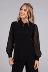 Sympli Mix Lace Twist Neck Top in Black. Twisted mock collar with keyhole opening. Long lace sleeves with cinched jersey cuff. Curved hem. Relaxed fit._t_34510284161224