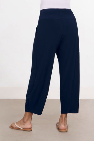 Sympli Narrow Lantern Pant in Navy. Yoke waistband and balloon leg with 2 front pockets. 25" inseam._34446720467144