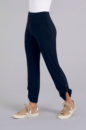 Sympli Quest Pant in Navy.  Dropped waist pull on pant with slash pocket.  Buttons at lower outside leg.  Convertible length.  Relaxed fit._34343100907720