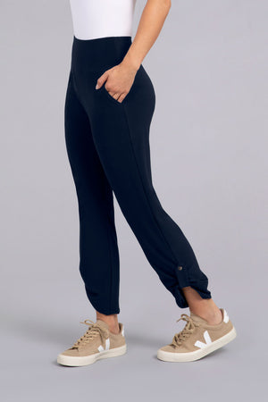 Sympli Quest Pant in Navy. Dropped waist pull on pant with slash pocket. Buttons at lower outside leg. Convertible length. Relaxed fit._34343100973256