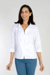 Cali Girls Swing Blouse in White.  Popover blouse with wide pointed collar and split v neck.  3/4 sleeve with split cuff.  Center front slit.  Single oversized front pocket.  Back inverted pleat.  High low hem.  Relaxed fit._t_34092565496008