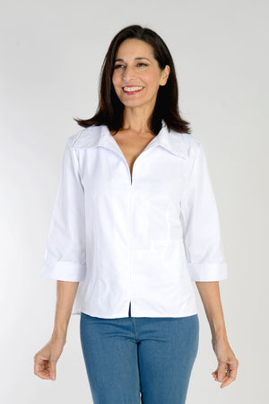 Cali Girls Swing Blouse in White.  Popover blouse with wide pointed collar and split v neck.  3/4 sleeve with split cuff.  Center front slit.  Single oversized front pocket.  Back inverted pleat.  High low hem.  Relaxed fit._34092565496008