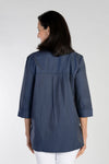 Cali Girls Boxy Half and Half Blouse in Navy/Black stripes. Convertible collar button down with 3/4 sleeve and split cuff. Subtle tone on tone print. Blouse is split in half at waist with print running bi-directionally. High low hem. Side slits.Relaxed fit._t_34092496453832