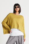 Planet Honeycomb Sweater in Chartreuse. Crew neck cropped sweater in textural honeycomb knit. Long sleeves, drop shoulders. High low hem. Rib trim at neck, cuff and hem. Oversized fit._t_33904924033224