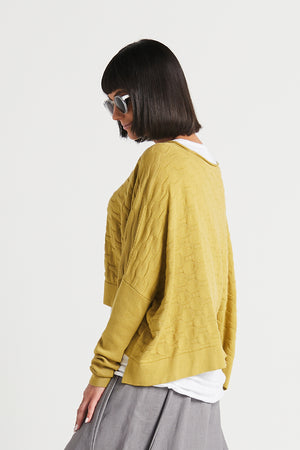 Planet Honeycomb Sweater in Chartreuse. Crew neck cropped sweater in textural honeycomb knit. Long sleeves, drop shoulders. High low hem. Rib trim at neck, cuff and hem. Oversized fit._33904924131528
