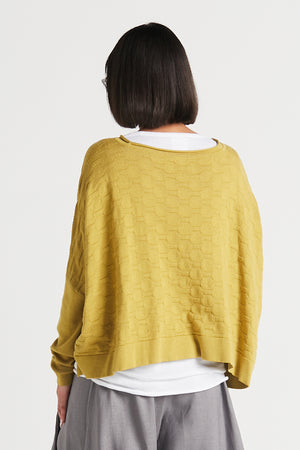 Planet Honeycomb Sweater in Chartreuse. Crew neck cropped sweater in textural honeycomb knit. Long sleeves, drop shoulders. High low hem. Rib trim at neck, cuff and hem. Oversized fit._33904924065992