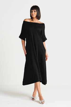 Planet Tokyo Dress in Black. Wide boat neck with elbow length sleeves.  Wide hem.  2 inseam pockets.  Swing shape.  Oversized fit._33905033838792