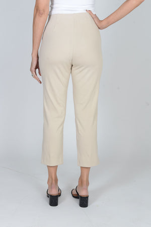 Holland Ave Susan Denim Crop Pant in Khaki. Pull on hidden waistband pant with faux zipper flap. Snug through hip falls straight to hem. Side slits. 25" inseam._34070715465928