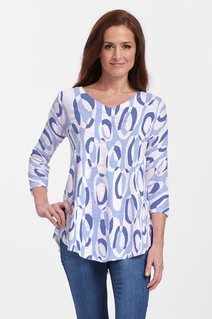 Whimsy Rose Loop Ta Loop Flowy Tunic.  Light and medium blue interlocking loops on a white background.  V neck 3/4 sleeve a line long tee.  Relaxed fit._34067268534472