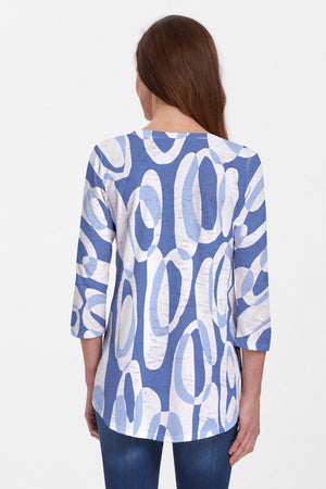 Whimsy Rose Loop Ta Loop Flowy Tunic. Light and medium blue interlocking loops on a white background. V neck 3/4 sleeve a line long tee. Relaxed fit._34067268501704