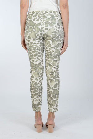 Organic Rags Spots Pant. Stylized animal print in Khaki on a white and beige background. Elastic waist pull on pant with metallic drawstring. 2 front slash pockets. Stretch crinkle fabric. Back pointed yoke detail. Convertible hem. Inseam: 27 1/2"_34011793981640