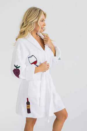 Unwind with the luxurious On Cloud Wine Terry Robe! Made from 100% cotton, this plush bathrobe is decorated in whimsical vino inspired illustrations and features two front patch pockets, a turned back shawl collar, and an adjustable self wrap belt for maximum comfort. _33553063870664