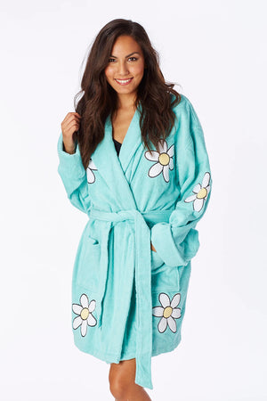 This super soft and cozy short length robe is the ultimate relaxation wear! Made from 100% cotton, this plush bathrobe is decorated in large illustrated daisies and features two front patch pockets, a turned back shawl collar, and an adjustable self wrap belt for maximum comfort. You'll be all smiles in this luxurious Daisy Terry Robe!_33767099171016
