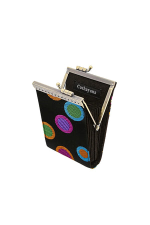 The Dot Card Holder is a stylish secure wallet with a lovely brocade fabric exterior, accordion-style pleated slots with RFID protection, and a golden metal snap clasp for easy access. Keep your money tucked away pretty and safely with this gorgeous travel friendly wallet! _33592046551240