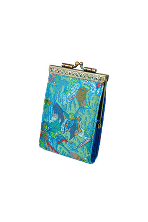 The Floral Card Holder is a stylish secure wallet with a lovely brocade fabric exterior, accordion-style pleated slots with RFID protection, and a golden metal snap clasp for easy access. Keep your money tucked away pretty and safely with this gorgeous travel friendly wallet! _33592076533960