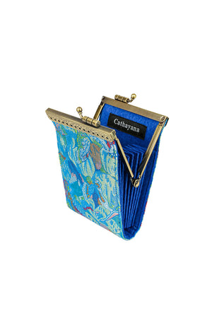 The Floral Card Holder is a stylish secure wallet with a lovely brocade fabric exterior, accordion-style pleated slots with RFID protection, and a golden metal snap clasp for easy access. Keep your money tucked away pretty and safely with this gorgeous travel friendly wallet! _33592076566728